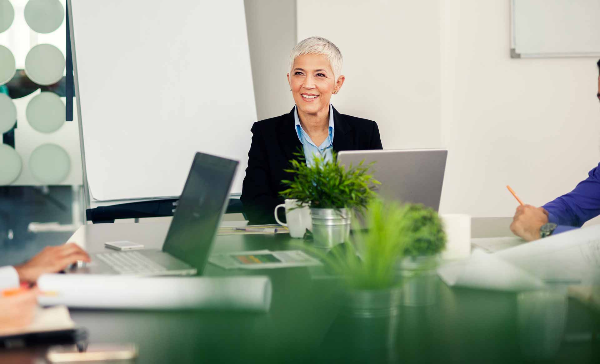 iStock-1065856616-(1) Woman behind laptop