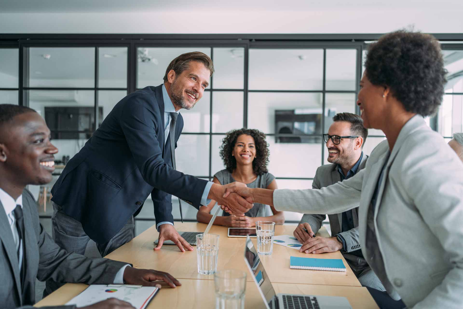 iStock-1444490817 handshake between two people at a business meeting
